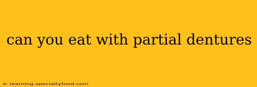 can you eat with partial dentures