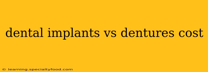 dental implants vs dentures cost