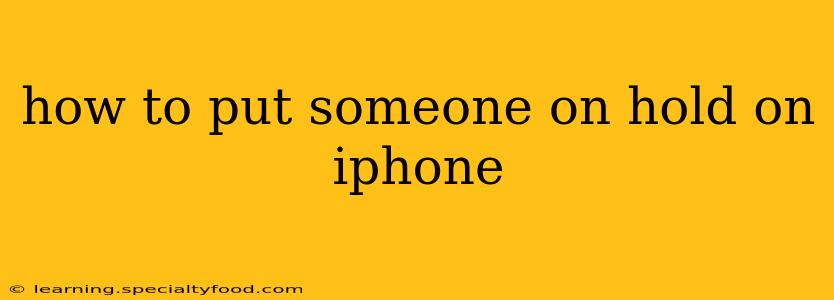 how to put someone on hold on iphone