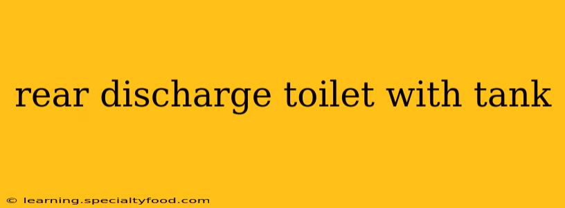 rear discharge toilet with tank