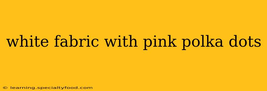 white fabric with pink polka dots